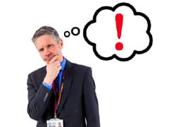 A man in suit thinking, he is alarmed